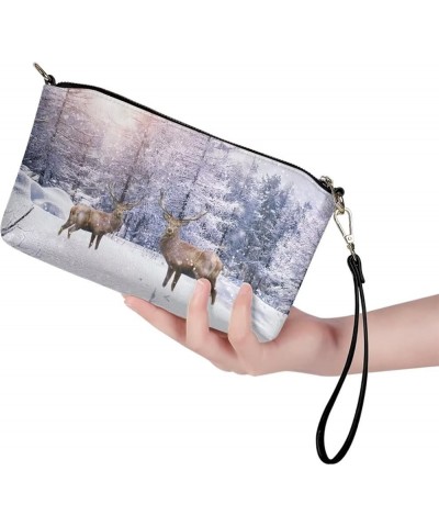 Print Purses for Women Crossbody Bag Belt Bag Leather Zip Clutch Travel Purse with Removable Wrist Strap Winter Reindeer $20....