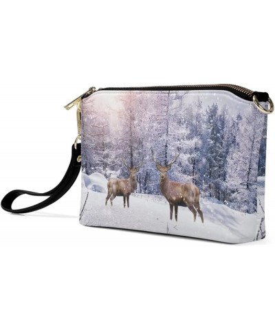 Print Purses for Women Crossbody Bag Belt Bag Leather Zip Clutch Travel Purse with Removable Wrist Strap Winter Reindeer $20....