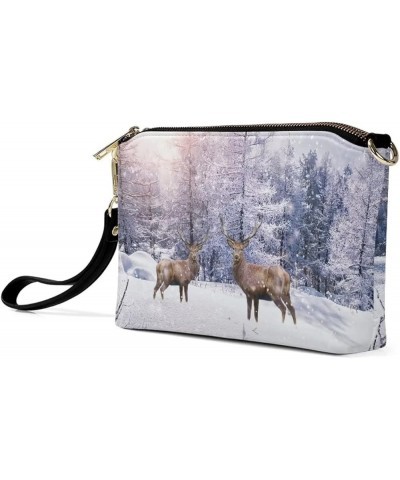 Print Purses for Women Crossbody Bag Belt Bag Leather Zip Clutch Travel Purse with Removable Wrist Strap Winter Reindeer $20....